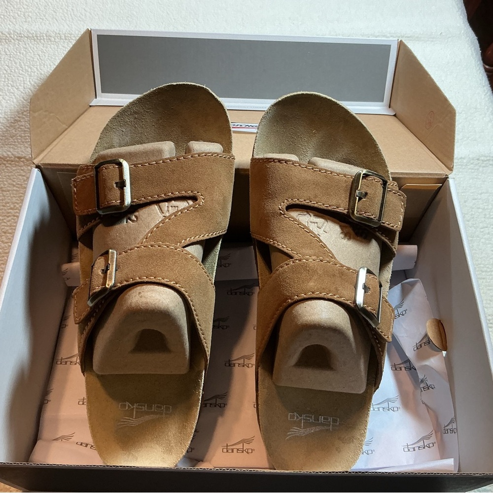 Dansko Tan Sandals.Only worn twice.REALLY cute with socks!Very comfortable!